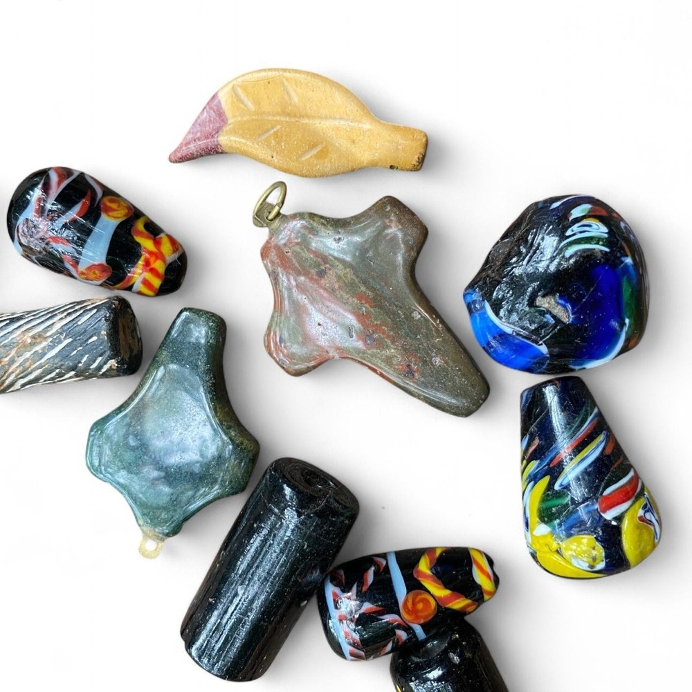 Assortment of 15 unique glass beads
